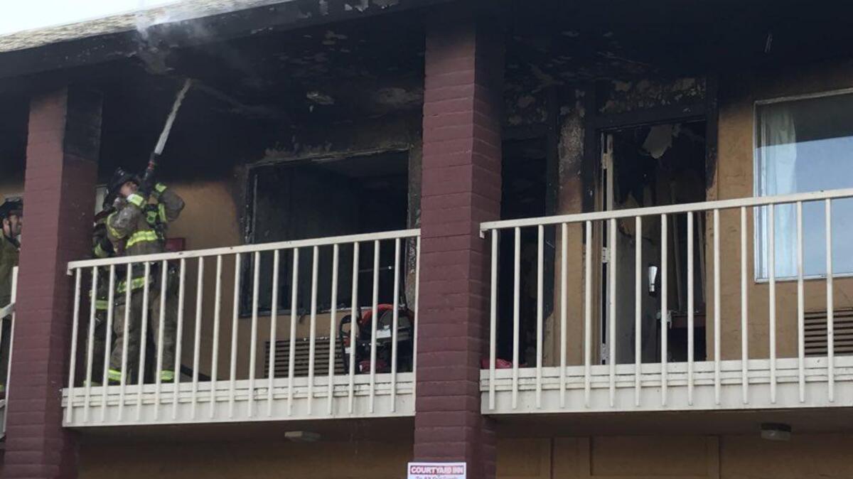Sacramento Metro Firefighters combatting a fire in a Courtyard Inn in North Highlands on Sunday, Nov. 19, 2017.