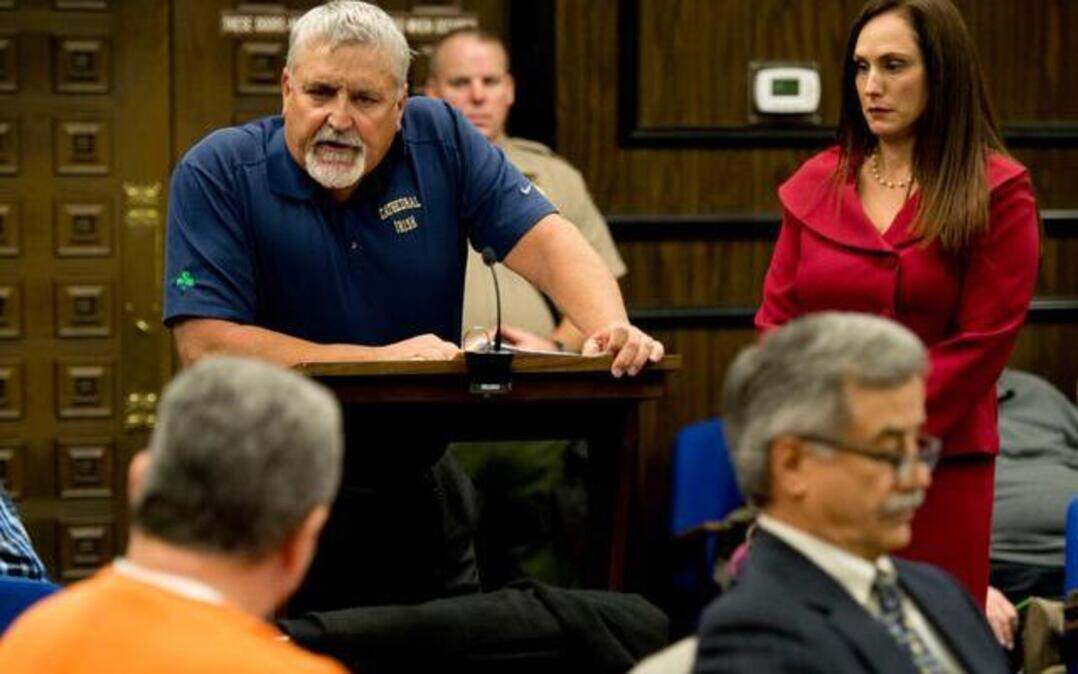 
Don Hatfield, the father of Rachel Winkler, confronts her husband Todd Winkler, left, as he reads a statement about his daughter during Winkler’s sentencing hearing Monday in El Dorado Superior Court. Winkler was sentenced to 26 years to life in prison for killing his wife, Rachel, with a pair of scissors.
