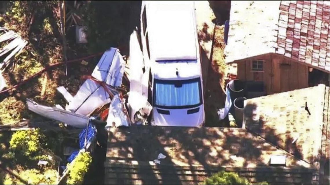 This image provided courtesy of KTVU-TV, shows a small plane that crashed into a home Friday, Nov. 18, 2016, in Moss Beach, Calif., killing one person and injuring another.