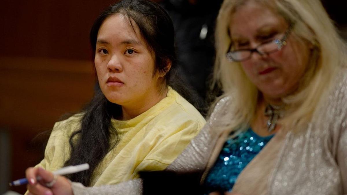 Ka Yang sits next to her attorney, Linda Parisi.