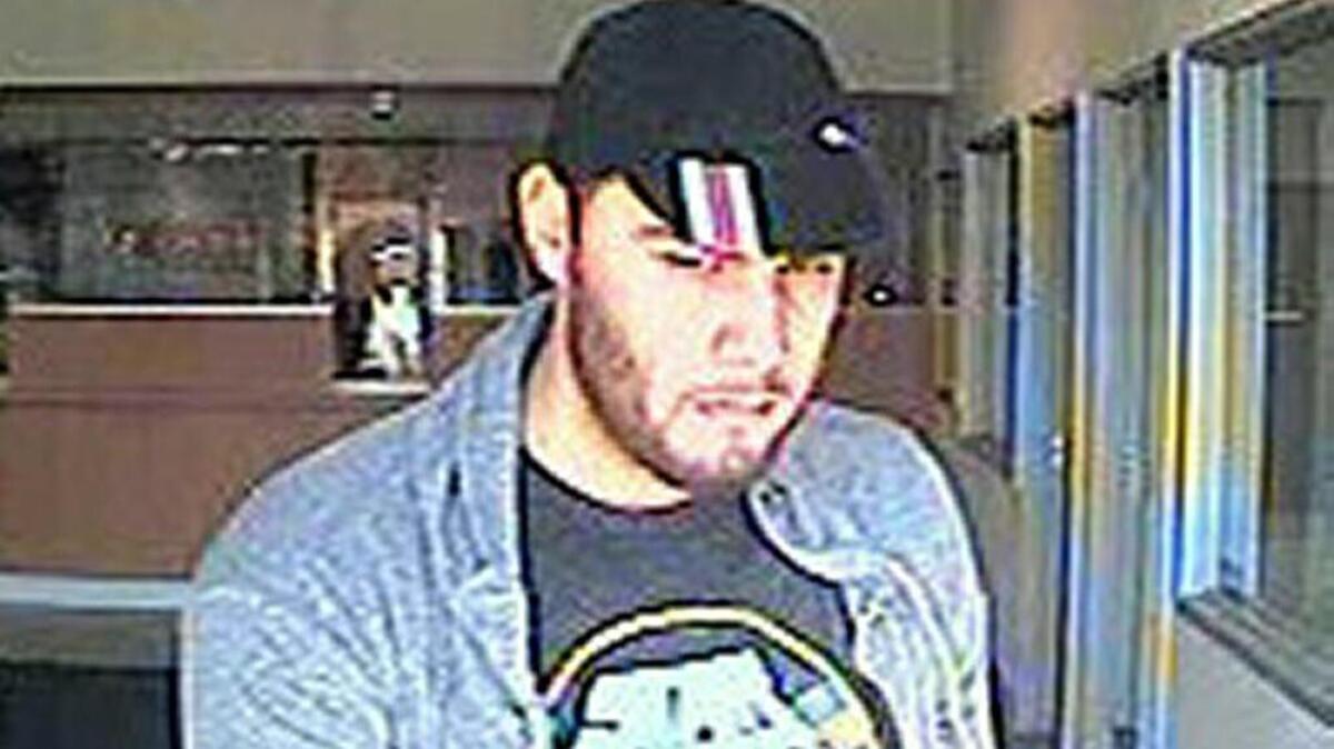 A surveillance shows a man sought in the Nov. 13 robbery of the Golden 1 Credit Union in the North Natomas area.