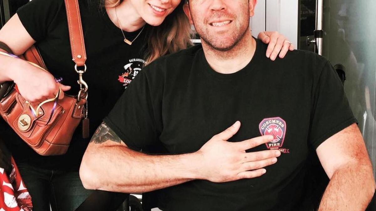 Firefighter Eric Oviedo heads home from hospital