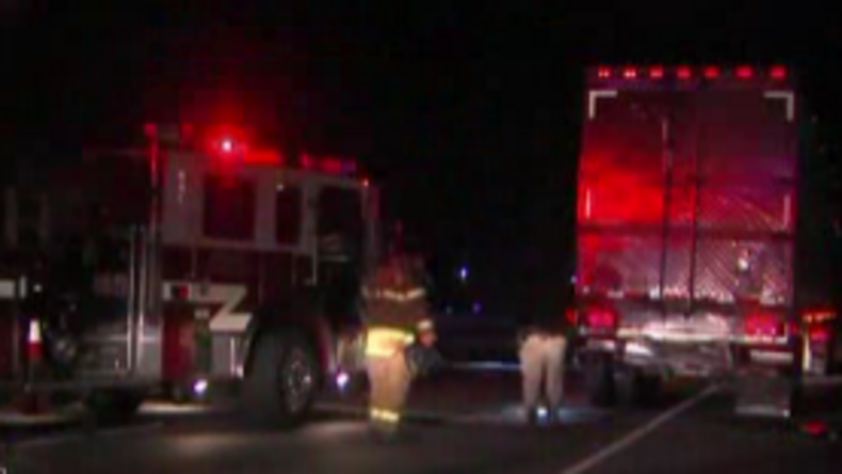 The scene of a crash between a car and a big rig early Thursday morning on Higway 50 at Howe Avenue.