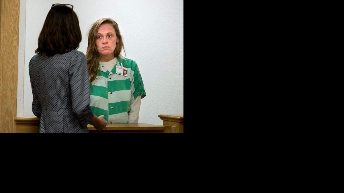 Samantha Green, the 23-year-old mother of Justice Rees, talks with Yolo County Public Defender Tracie Olsen, left, at her arraignment on Wednesday. <252><137,,>stands with Samantha Green the mother of 3-week-old Justice Rees as she is arraigned in the child's death Wednesday, March 4, 2015in Woodland. Green plead not guilty to felony charges of involuntary manslaughter and abusing or endangering the health of a child.<252><137>
