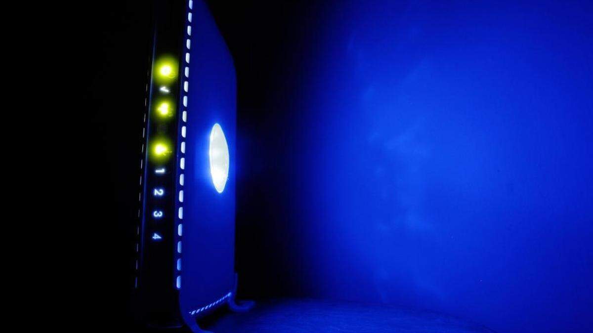 Displayed is a LED-illuminated wireless router in Philadelphia, Sunday, July 27, 2008. (AP Photo/Matt Rourke)