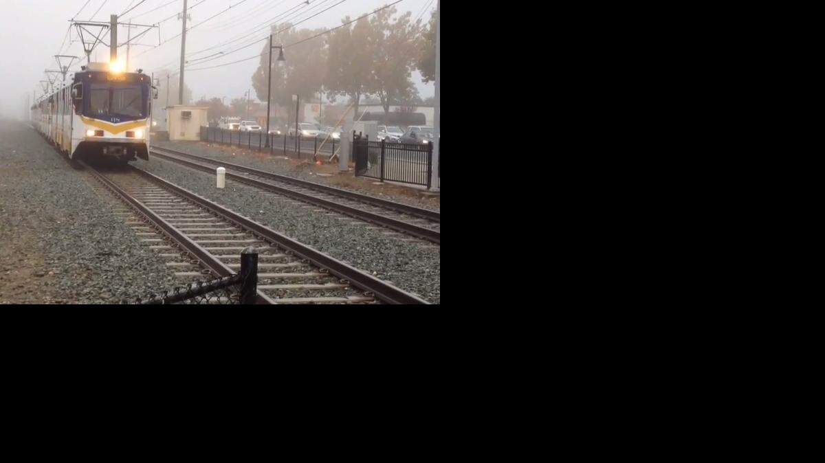
A train goes through the intersection of Coloma Road and Folsom Boulevard in Rancho Cordova the day after a teen was struck and killed on the tracks.
