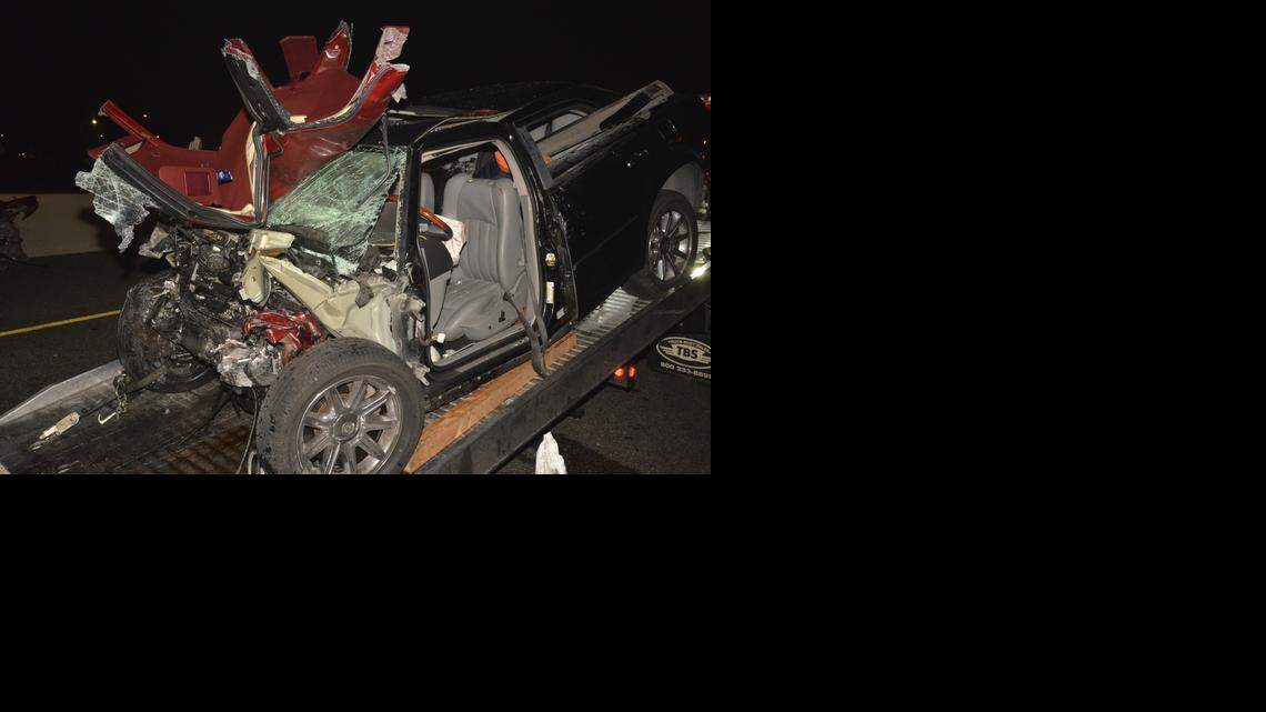 
A 2006 Chrysler 300 that was driven by Aaron Jordon Caudillo, according to the California Highway Patrol, is loaded onto a tow truck early Saturday. The Chrysler slammed into a Buick Regal on Interstate 80, killing Matthew Azar, 20, Kendra Langham, 18, and Mathew Beardwitt, 18. Caudillo was hospitalized and may face charges. 



