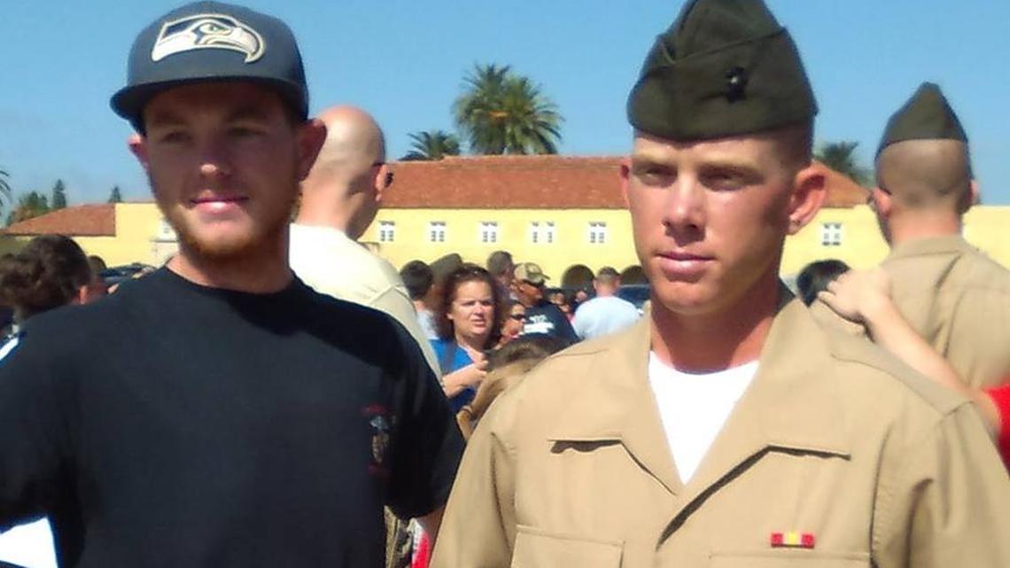 Ryan Harris, right, with his brother Trevor Harris during a Marine boot camp graduation in 2015.