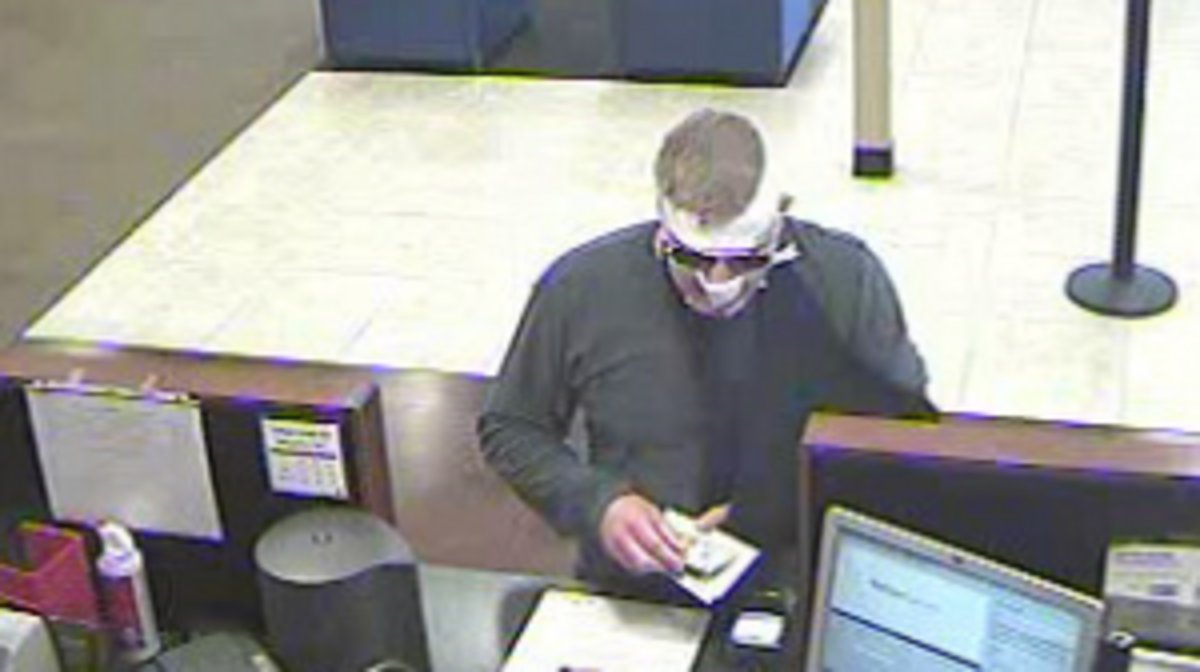 A surveillance photo shows a man sought in the robbery of a chase Bank in El Dorado Hills.