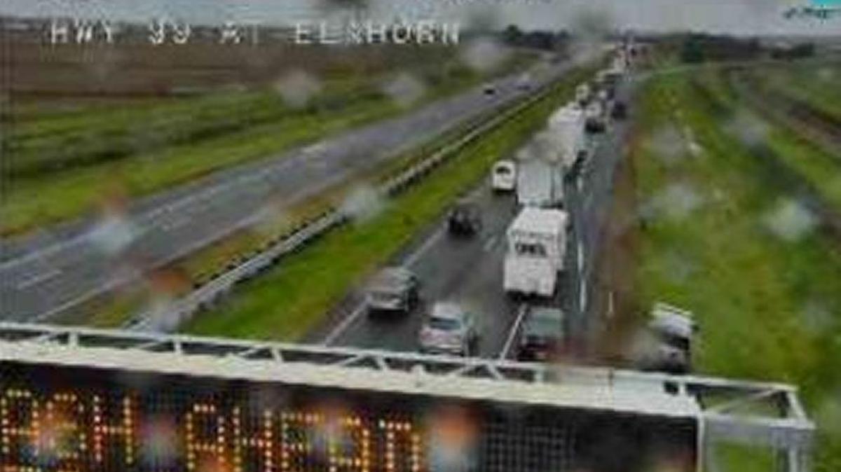 An overturned big rig has backed up traffic on southbound Highway 99 at W. Elkhorn Boulevard.