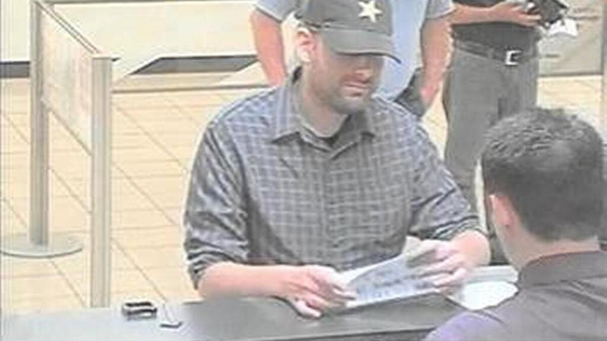 A surveillance photo shows a man suspected of robbing a Bank of America in Yuba City on July 6, 2017.
