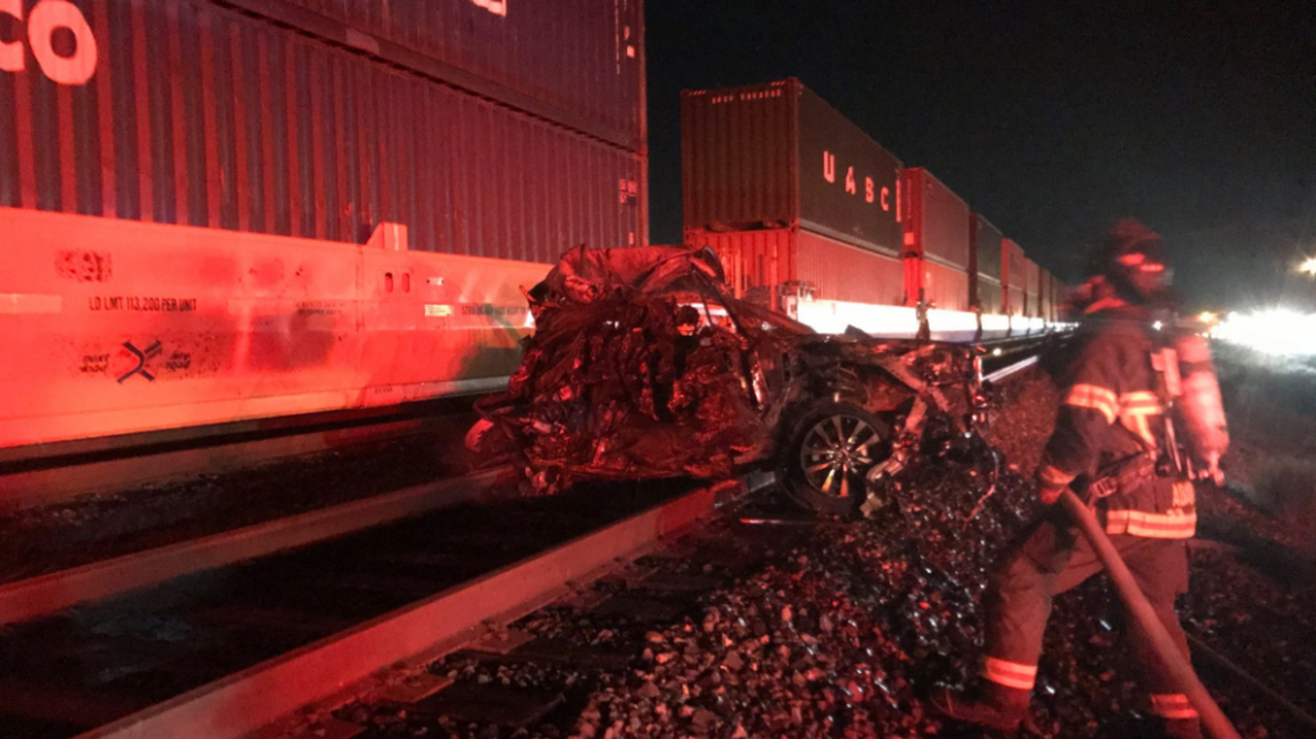 Bystanders rescued an elderly couple Wednesday night in Fairfield before a train slammed into their vehicle, reported Fairfield firefighters.