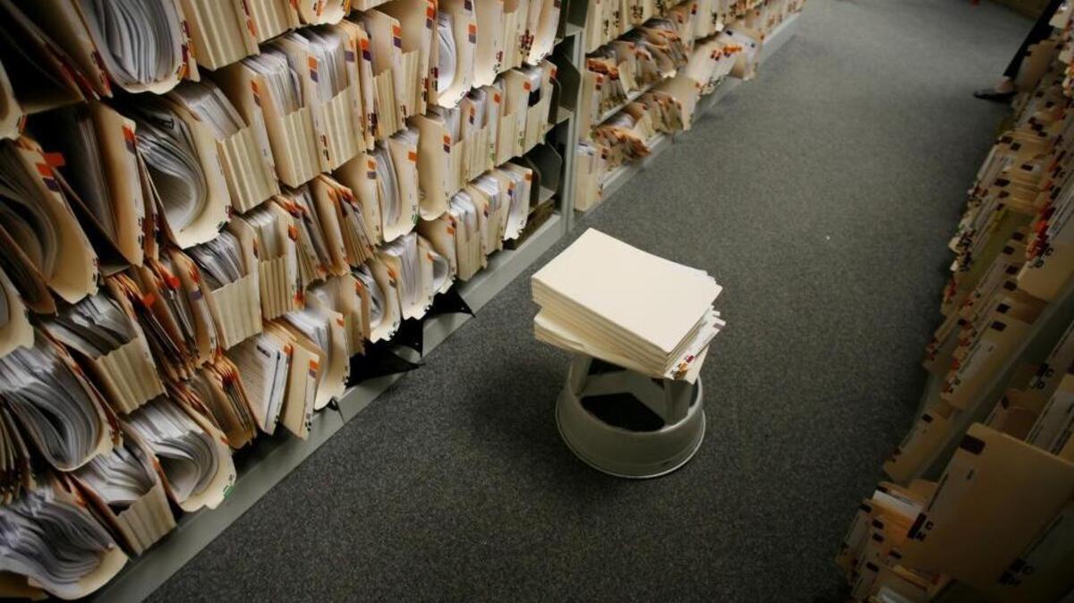 Campaign finance papers fill the shelves in the California secretary of state’s office in 2007. Sacramento County is expected to require that candidates post campaign finance statements online starting in August.