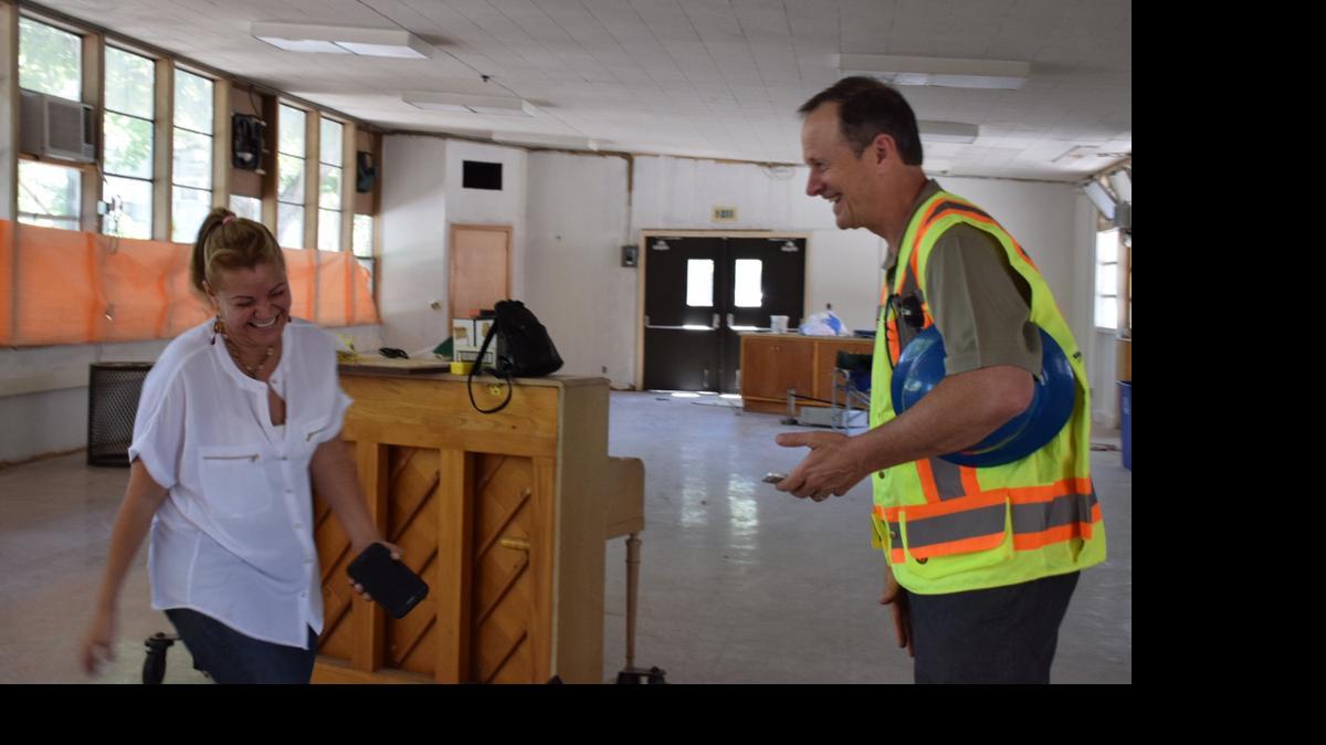 
Saara Burga, 48, the director of the Brazilian Center for Cultural Exchange, talks to Richard Rich, president of the future art complex’s board of directors, about reusing doors removed from the main building.
