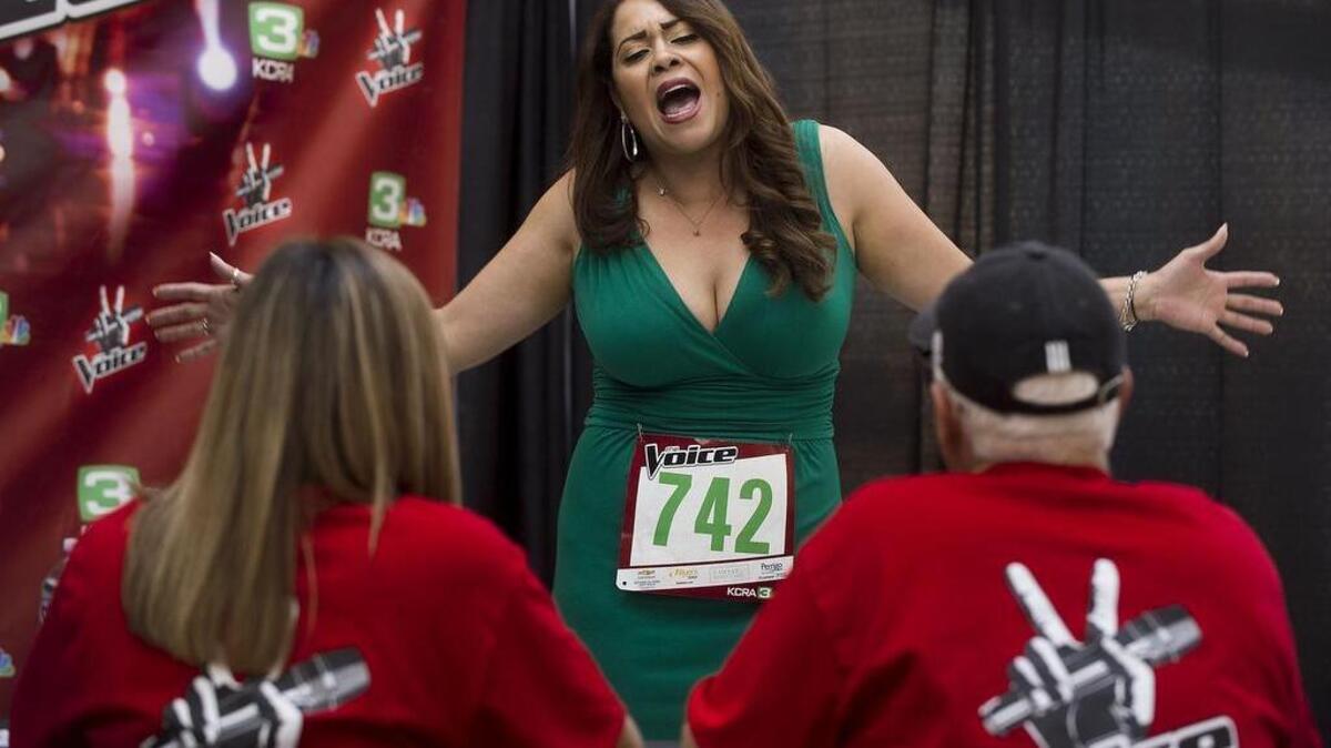Monik Vega of Elk Grove sings a song called "Me, Myself, and I" during local auditions for the TV show, "The Voice" at Arden Fair Mall in Sacramento on Friday, April 1, 2016.