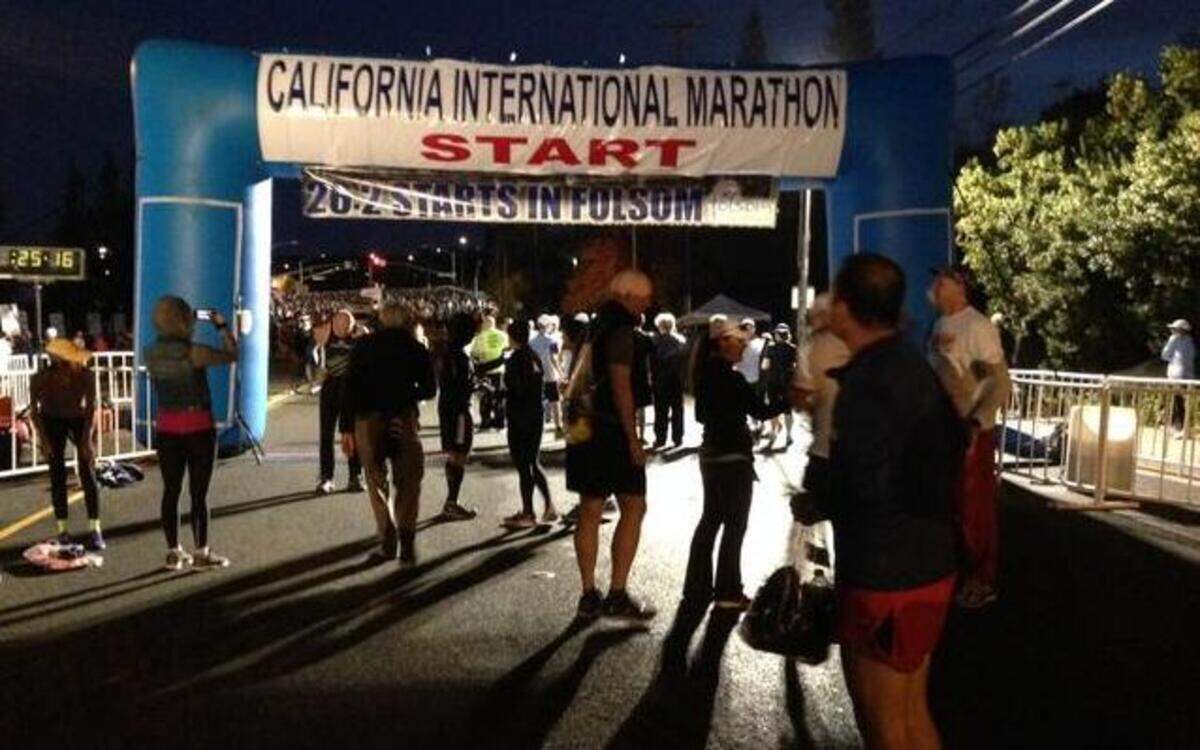 
Runners prepare for the start of the 2014 California International Marathon on Sunday morning.
