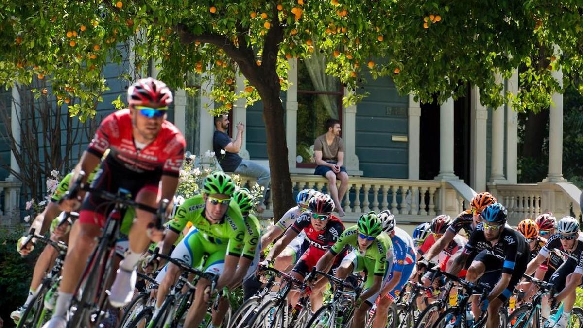 The Amgen Tour of Californian peloton sweeps around the corner from P and 18th streets in Sacramento in May, 2014. Those who design the route for each stage are concerned with how the event looks on camera. They want to show mountains, farms, wineries, vineyards, quaint towns, big cities, high mountains and rugged coastlines. This year, a roaring blur of a finish around Capitol Park on Sunday, will bring thousands of fans cheering on the athletes.