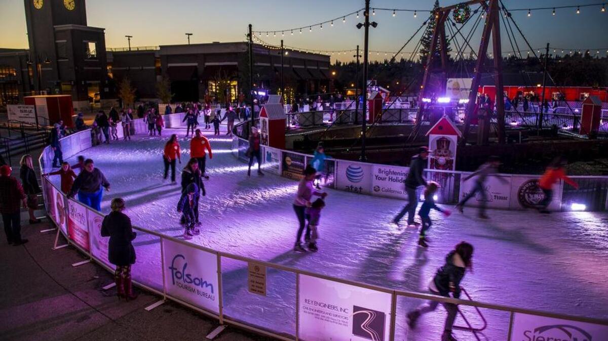 Children and adults enjoy an evening of ice skating at the Folsom Ice Rink in Old Folsom, Calif., in November 2015.