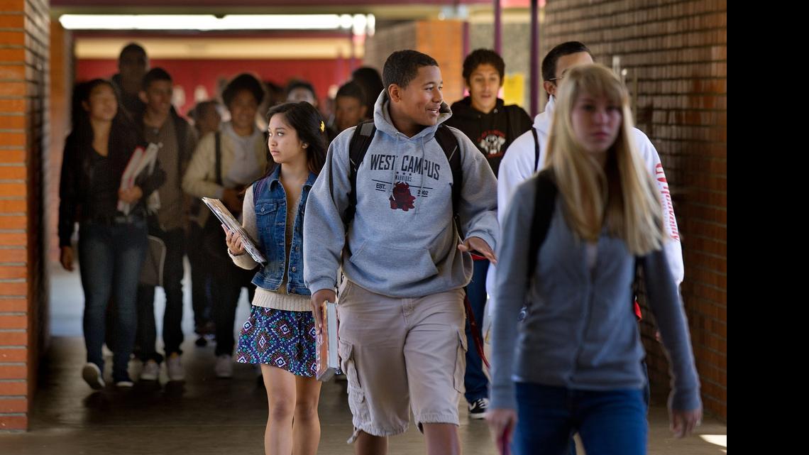 Students stroll the halls of West Campus High School, part of Sacramento City Unified School District. 

