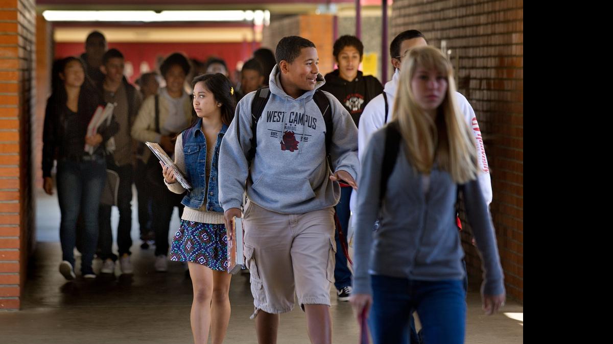 Students stroll the halls of West Campus High School, part of Sacramento City Unified School District. 
