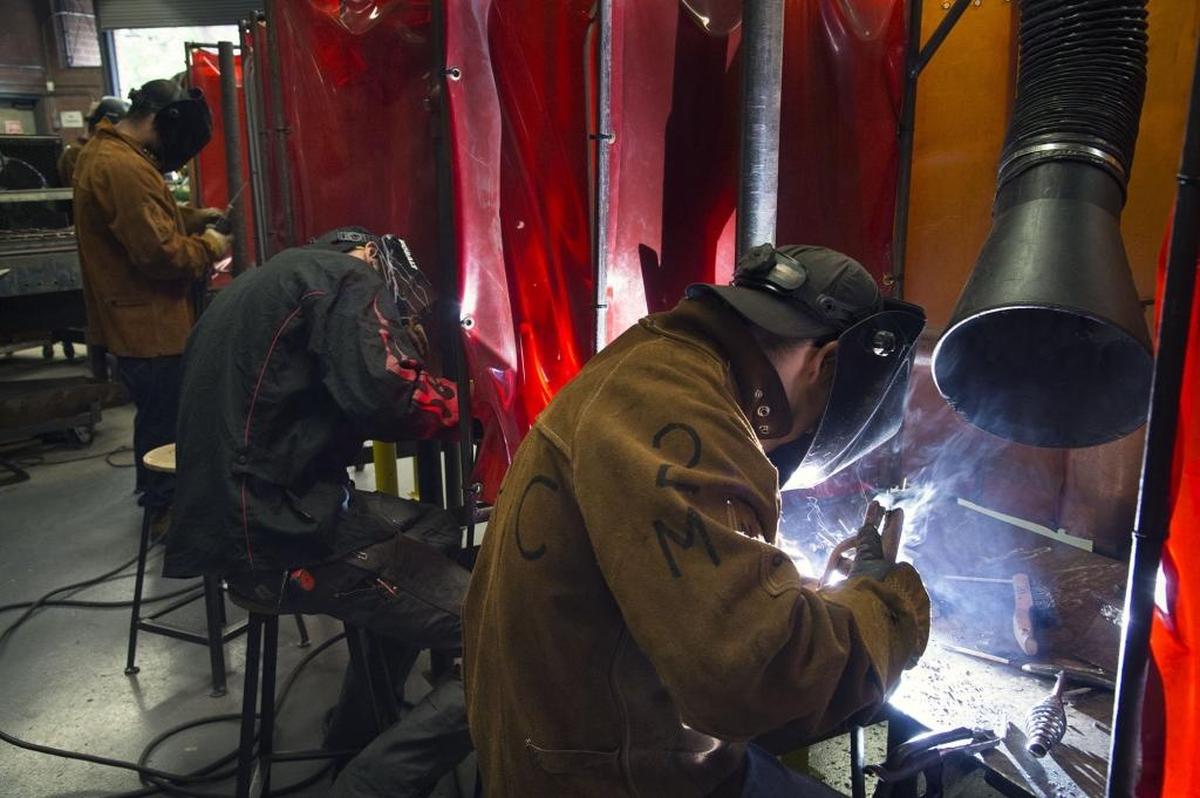 Students in the welding technology program at American River College practice their arc welding skills during class on Thursday, September 14, 2017 in Sacramento, Calif. Community Colleges are shifting focus from helping students move toward a four-year degree to helping them complete certificates in their Career Education Program.