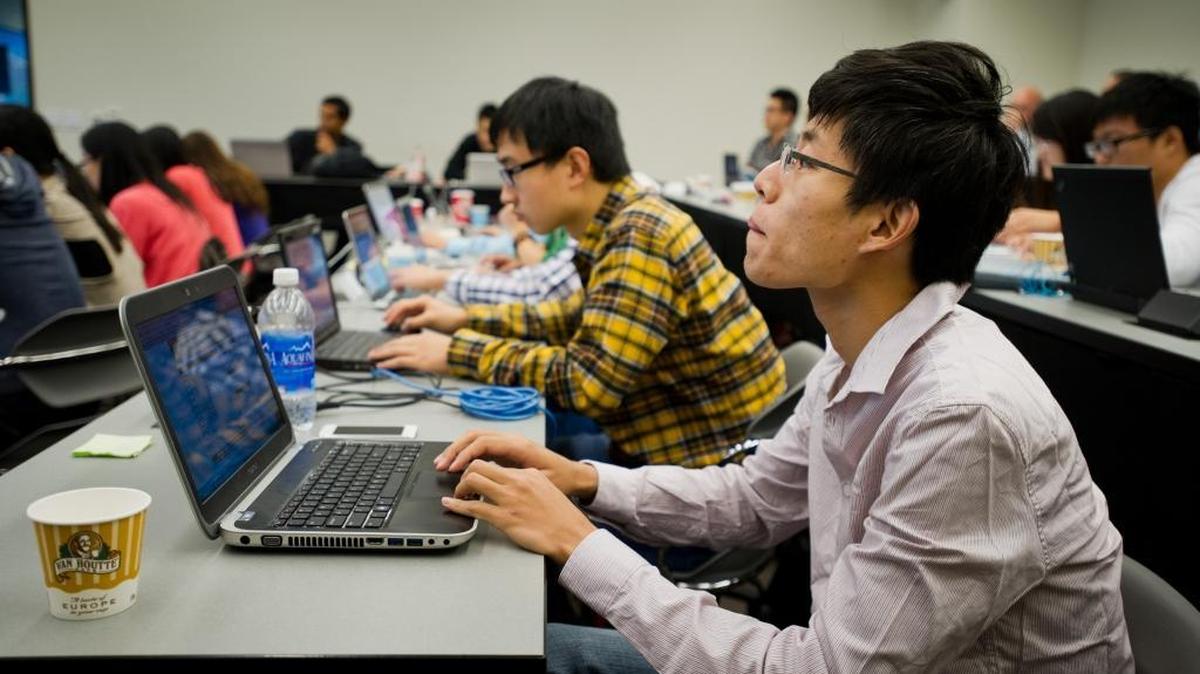 Zichao “Eric” Wang during a microeconomics class taught by Ramya Ghosh at the Drexel Center for Graduate Studies, which offered a master’s of science in finance. October 11, 2012
