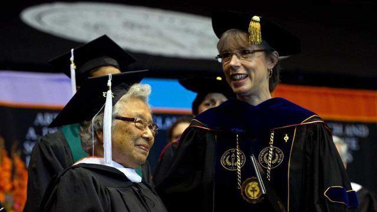FILE -- President Pamela A. Eibeck, left, honors Ida Takagashi Inouye at the University of the Pacific graduation ceremony on May 4, 2013. Eibeck has announced plans to retire on July 1, 2019.