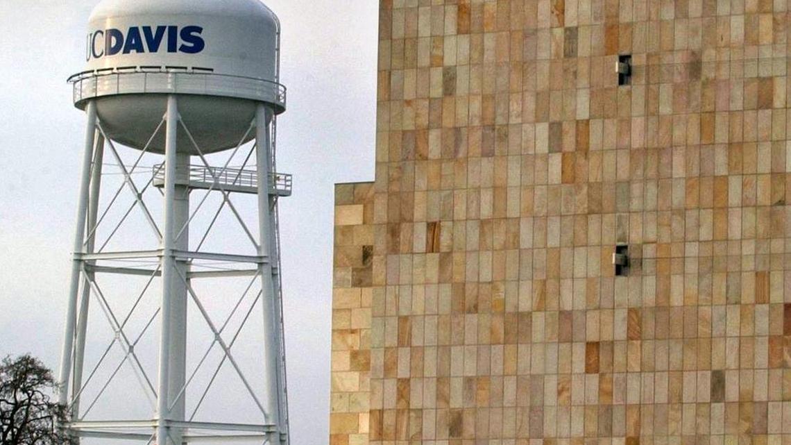 With the landmark UC Davis water tower looming in the background, the new UC Davis Mondavi Center is seen Friday January 4, 2002.