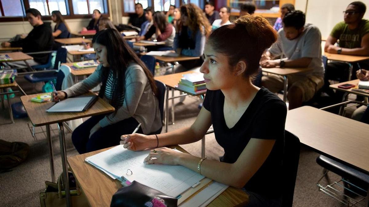 
Student Angie Olivas takes notes during a Human Career Development class at Sacramento City College in Sacramento on Tuesday, Oct. 6, 2015. After years of rising Latino enrollment at Sacramento State and Sacramento City College, both campuses will receive millions of federal dollars by qualifying as Hispanic-Serving Institutions for the first time. Twenty-seven percent of Sacramento State's students and 29 percent of Sacramento City College's students were Latino in 2014, according to data from the schools. 
