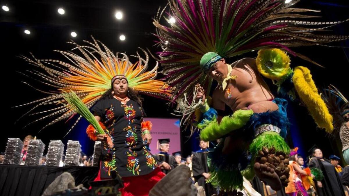 Danza Citalli performs an Azteca dance for the 254 Latino student graduates during the 32nd annual “Chicana/o Latina/o Graduation Celebration” ceremony at the Mondavi Center at UC Davis on Sunday, June 12, 2016, in Davis, Calif.