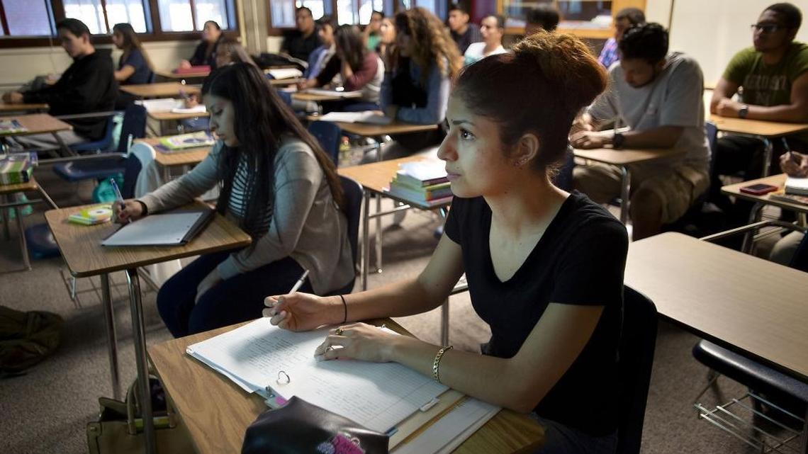 Student Angie Olivas takes notes during a Human Career Development class at Sacramento City College in 2015. That year, Sacramento City College received a $3.9 million federal grant to boost the number of Hispanic and low-income students enrolling in science, technology, engineering and math programs.