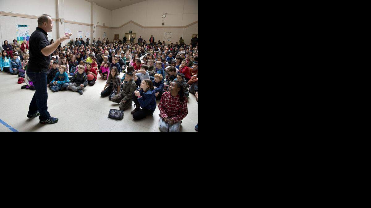 
Polar explorer and motivational speaker Robert Swan speaks to students in the auditorium at Leonardo da Vinci School in Sacramento earlier this month. Leonardo da Vinci, a highly sought-after public school, prides itself on parent participation. It no longer states on its website that families will be penalized for not volunteering after a civil rights group last year brought attention to the issue statewide, particularly at charter schools.
