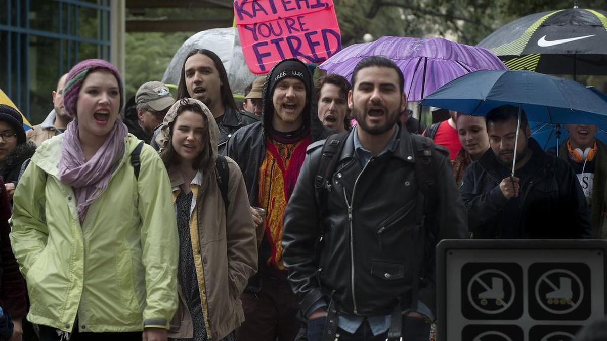 A group of protestors marches toward the chancellor’s office on the UC Davis campus in Davis on Friday, March 11, 2016. Organized by the UC Student Workers Union, approximately 35 students marched across campus to UC Davis Chancellor Linda Katehi’s office to insist on her resignation.