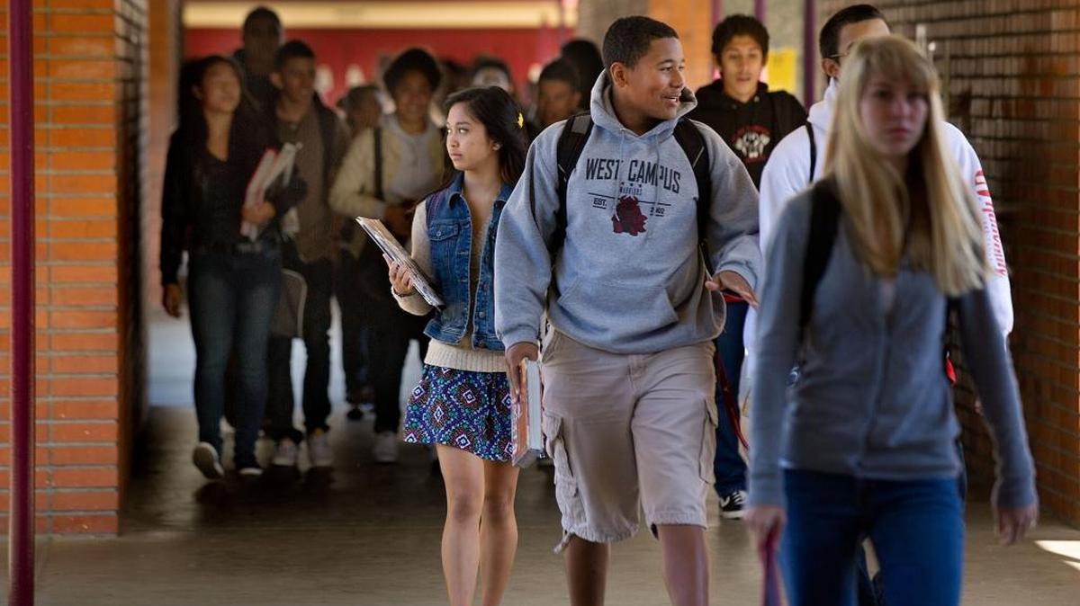 Students walk through the halls between classes at West Campus High School on Thursday, November 10, 2011.