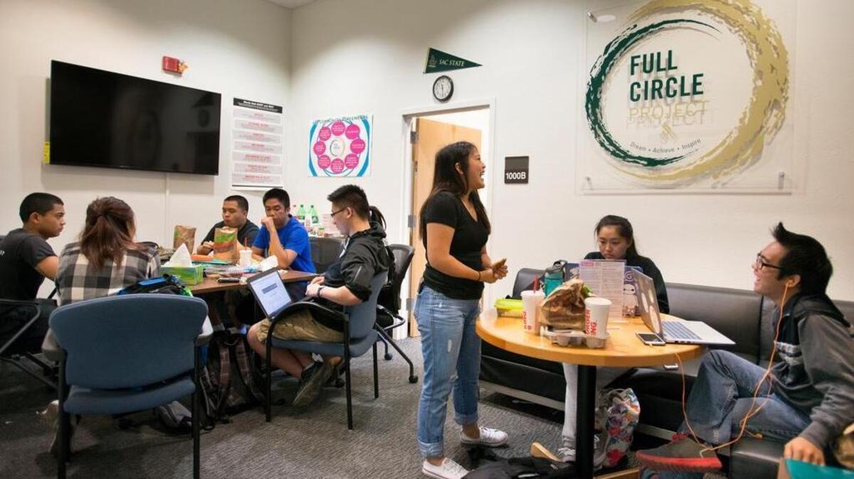 Students study, eat lunch and talk Oct. 15, 2019 inside Sacramento State’s Full Circle Project office, which is supported by AANAPISI funding.