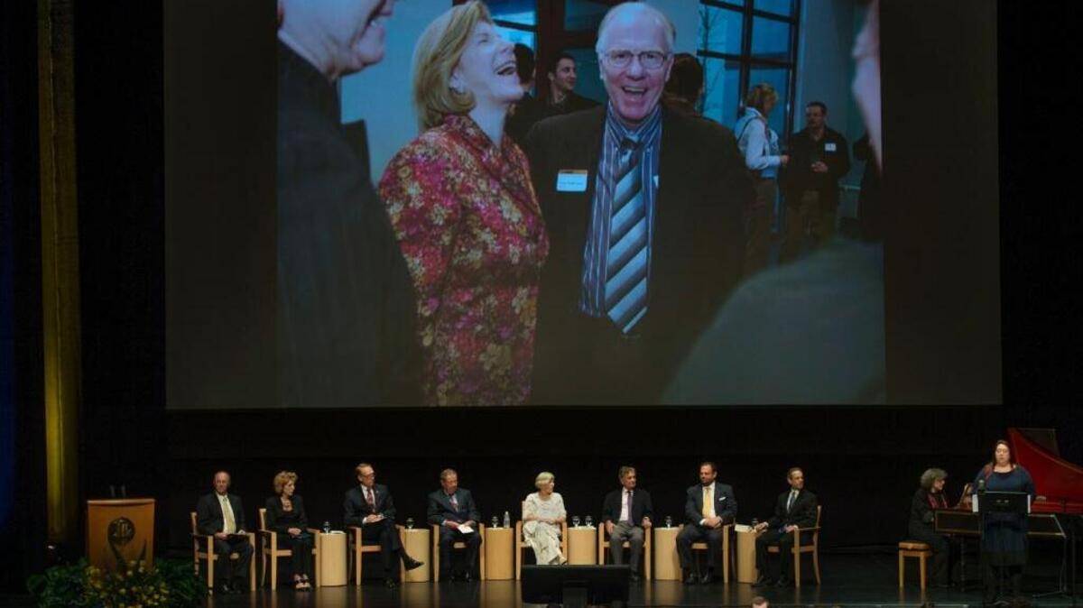 Family, friends and colleagues attend a memorial service celebrating the life of Chancellor Emeritus Larry N. Vanderhoef pictured at right on the big screen at the Robert and Margerit Mondavi Center for the Performing Arts at the University of California Davis on Nov. 4, 2015 in Davis, Calif. Vanderhoef died on Oct. 15, 2015 at the age of 74. Speakers who contributed to the celebration of life, from left, Provost and Executive Vice Chancellor Ralph Hexter, UC Davis Chancellor Linda P.B.Katehi, California Community Colleges Chancellor Brice Harris, Provost/Executive Vice Chancellor to Chancellor Vanderhoef Robert Grey, Provost/Executive Vice Chancellor to Chancellor Vanderhoef Virginia Henshaw, Distinguished Professor Emeritus Zuhair Munir, student body president during Chancellor Vanderhoef's tenure Seth Merewitz, Assistant Vice Chancellor for Campus Planning and Community Resources Robert Segar and Vanderhoef's wife Rosalie.