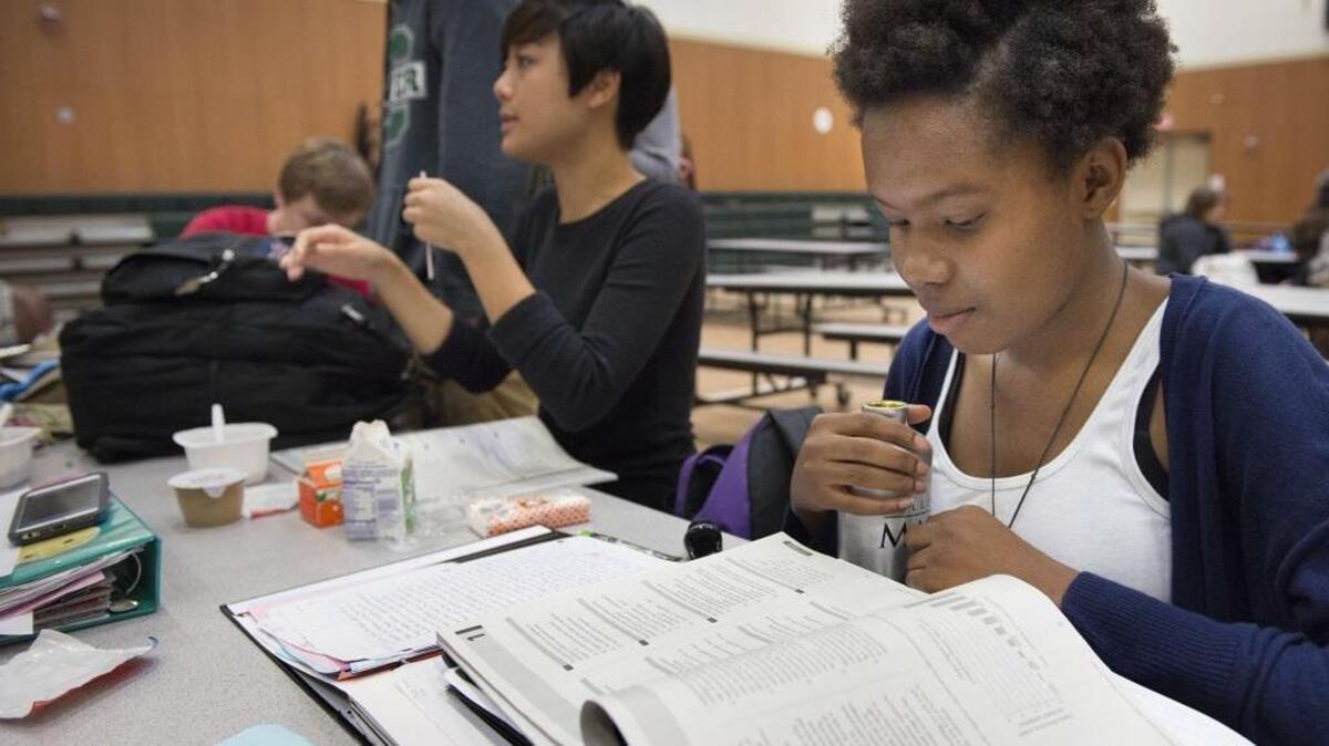 Historically, Sacramento City Unified has had one of the latest start dates among local districts. Jade Thomas, 15, a junior at George Washington Carver School of Arts and Science, goes over study material before she takes the PSAT test on Wednesday, October 14, 2015, in Sacramento, Calif.