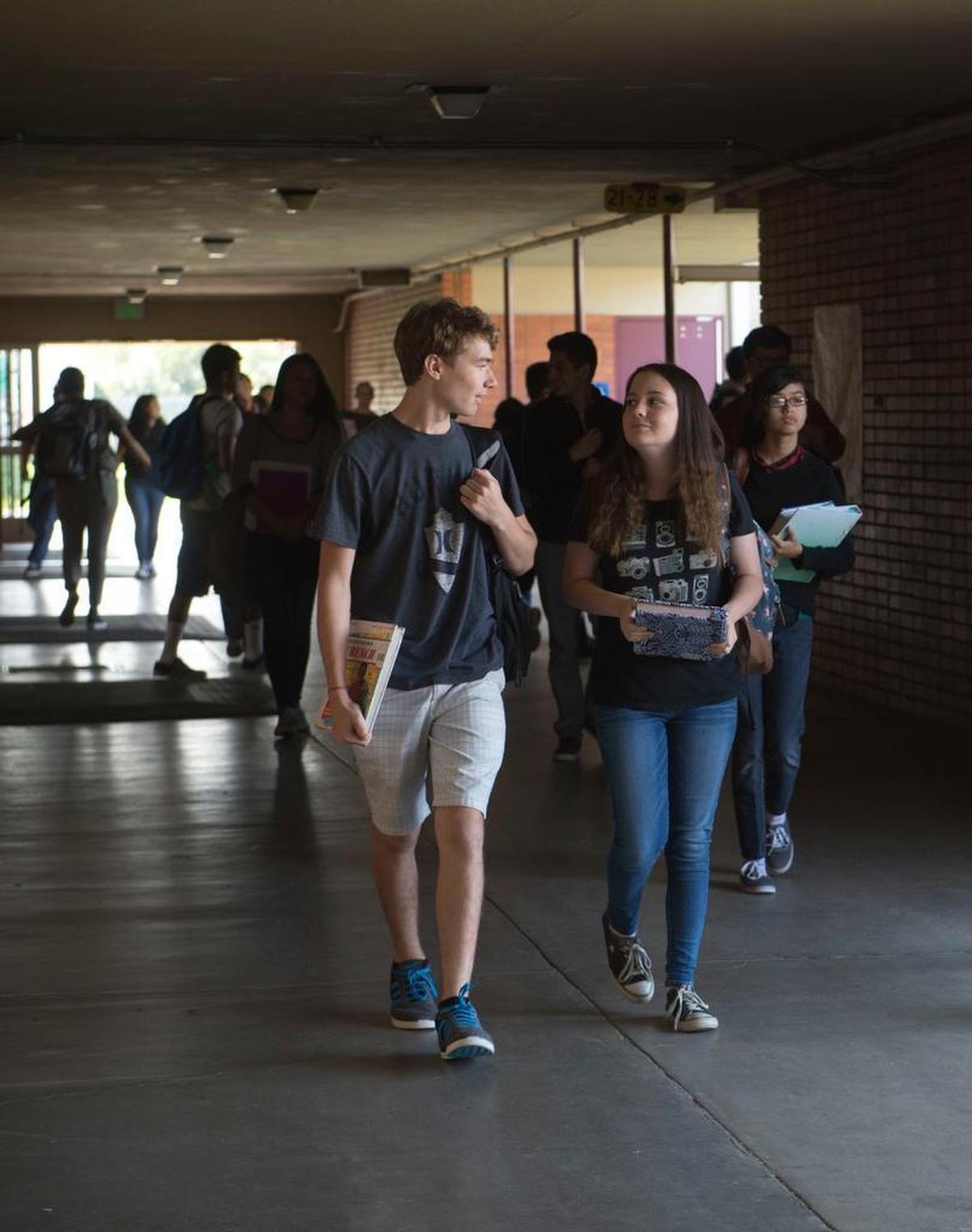 Christine Ainger and Owen Bianchini Stults, sophomores at West Campus High School, make their way down the halls between classes in 2015. Niche ranked the school No. 1 on its list of the top 10 public high schools in Sacramento County for 2025.
