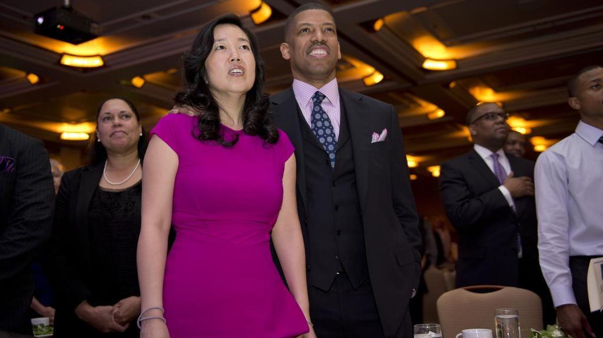 Michelle Rhee and then-Sacramento Mayor Kevin Johnson at the St. Hope Benefit Dinner in Sacramento on Friday, Jan. 11, 2013. The city teachers union says it has gathered enough signatures to unionize educators at the St. Hope charter school system.