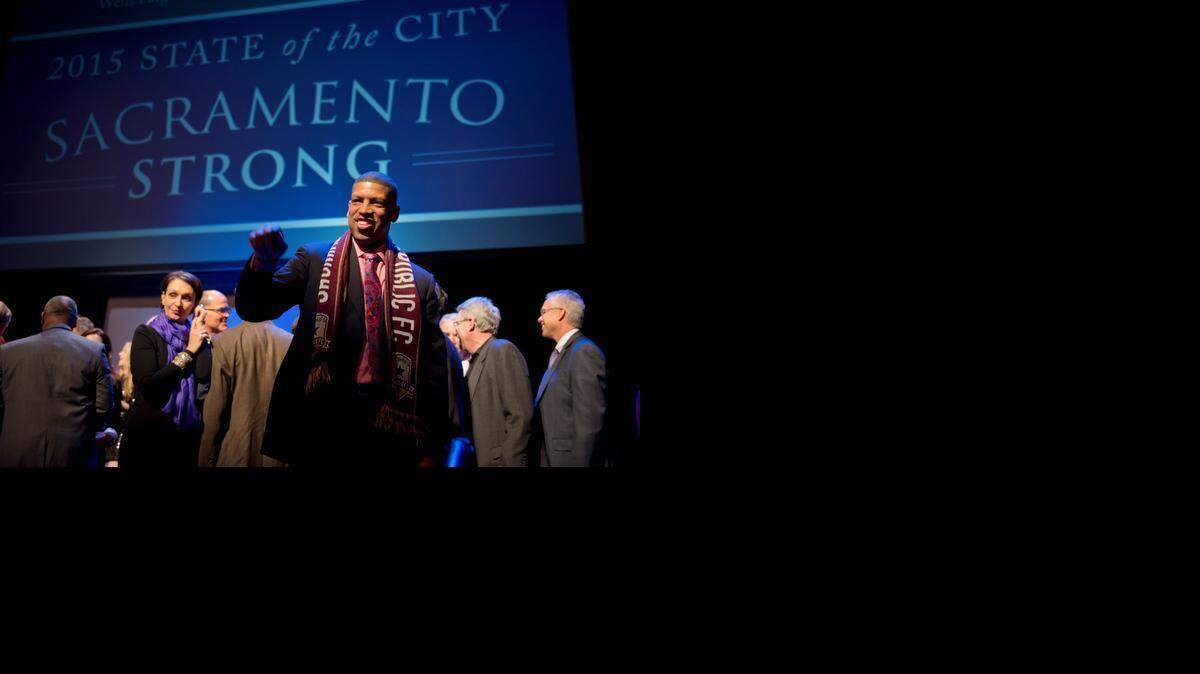 
Mayor Kevin Johnson enjoys the moment after his State of the City address Thursday at Memorial Auditorium downtown. Key topics included body cameras for police, a local minimum wage, and a push to build 10,000 new housing units in downtown over the next decade.
