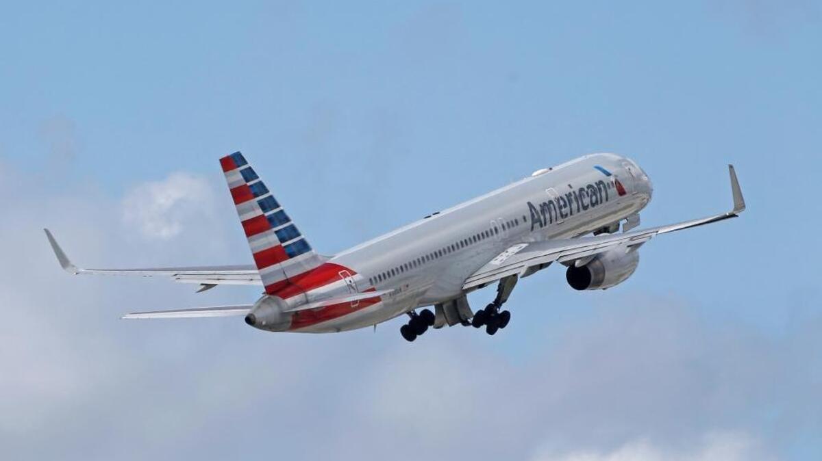 In this Friday, June 3, 2016, photo, an American Airlines passenger jet takes off.