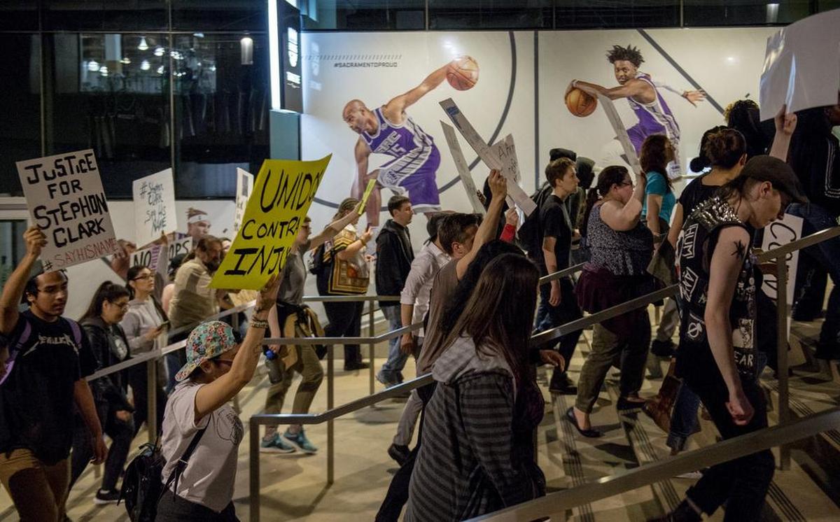 Black Lives Matter Sacramento marched down K Street onto David Stern Way and into the plaza at the Golden 1 Center in downtown Sacramento on Friday, March 30, 2018 in the wake of private autopsy findings that police shot Stephon Clark in the side and back.