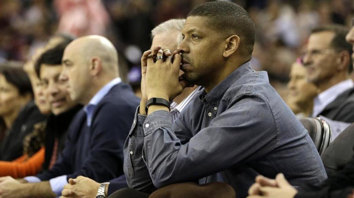 Sacramento Mayor Kevin Johnson sits court side as he watches the Sacramento Kings play the Charlotte Hornets in an NBA basketball game Monday, Jan. 25, 2016, in Sacramento.