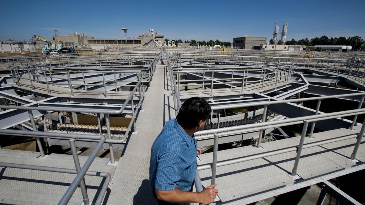 Director of operations, Ruben Robles, on top of one of the many secondary treatment tanks at the wastewater treatment plant for the Sacramento Regional County Sanitation District near Elk Grove, Calif., on Friday, May 16, 2014. The plant is going through a billion-dollar upgrade to limit the pollutants it discharges while at the same time trying to figure out how to sell more recycled water to large users.