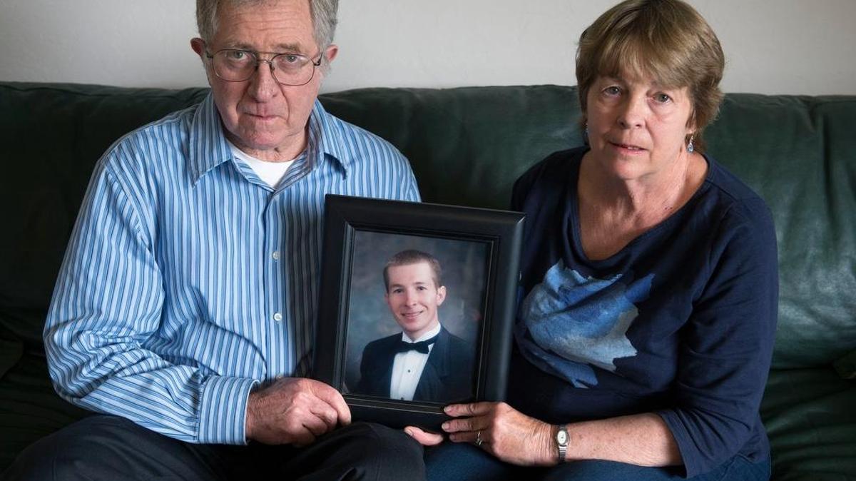 Bill and Katie Robinson hold a portrait of their son, Matthew Clayton Robinson, on April 25 in Orland. Off his medications for bipolar disorder and in the midst of a breakdown, Robinson, 33, was in the back of a vehicle transporting him to Restpadd psychiatric facility in Redding in July 2014 when he began shouting, bouncing and flailing inside the van. By the time he arrived, the driver had summoned police for help in removing Robinson from the van. Officers pummeled his face and pinned him to the ground, placing a fabric hood over his head designed to prevent him from spewing blood and saliva. Within minutes, Robinson was unresponsive. He wound up in a coma and died seven days later. His parents are suing the city and police, alleging violations of their son’s civil rights.