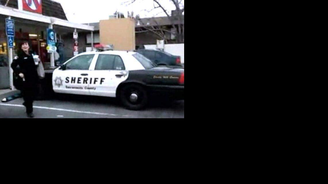 
A screen grab taken from a Fox40 video shows a Sacramento Country sheriff’s deputy exiting a Circle K store and preparing to get into her squad car, which was parked in a spot reserved for vehicles displaying proper permits.
