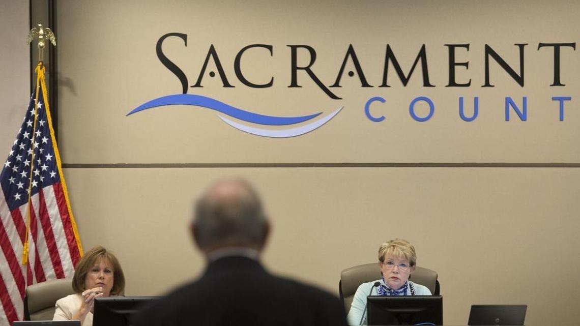 John Bloomer of Sacramento addresses board members Susan Peters, left, and Roberta MacGlashan during a meeting with county supervisors. Development interests have accounted for two-thirds of the contributions and independent expenditures in Sacramento County supervisor races this year, a Sacramento Bee analysis shows.