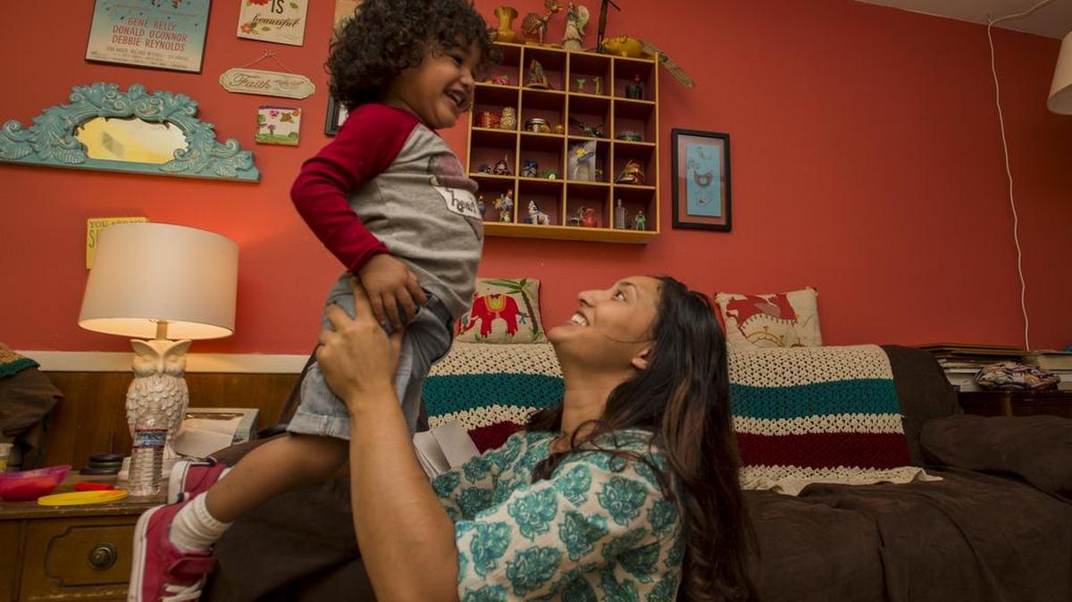 Theresa Espinoza, 23, plays with her son Judah Espinoza on Monday night, June 12, 2017 at their home in Rancho Cordova. Theresa joined the Birth and Beyond program at the Folsom Cordova Family Resource Center, attending over 50 classes to better raise her child. An AmeriCorps volunteer comes out to her house about once a week for an hour and a half to gives her parenting lessons and child health information and let her vent and ask questions.