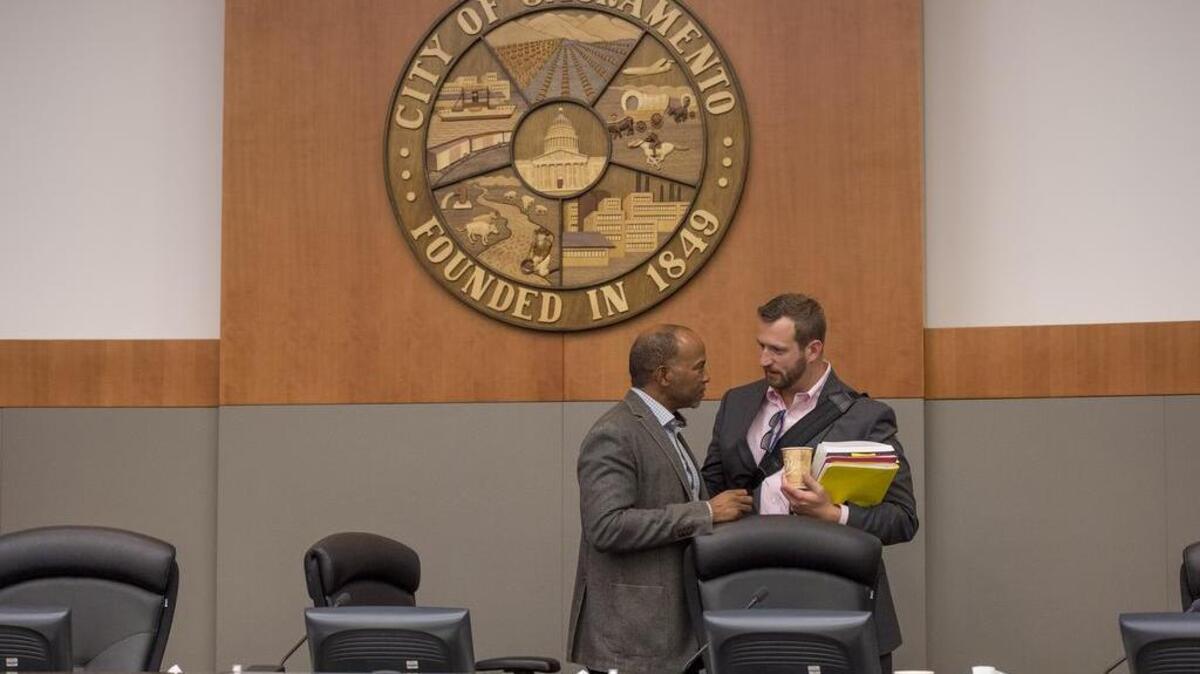Allen Warren, left, Steve Hansen and the rest of the Sacramento City Council will discuss the budget today.