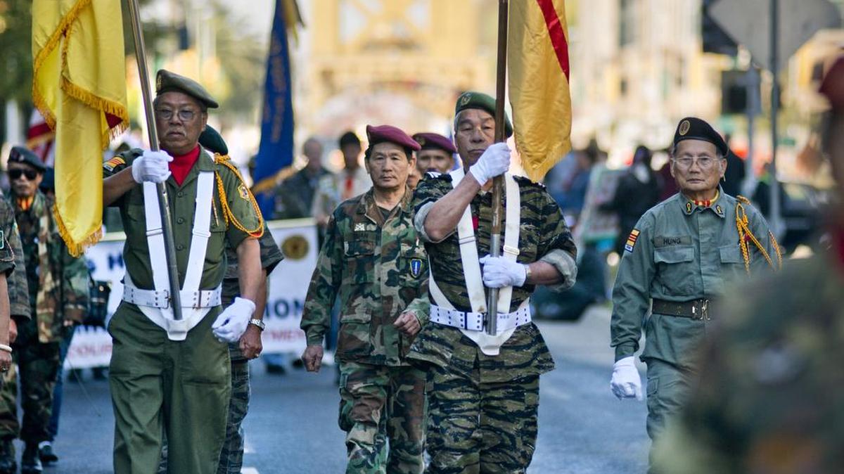 Members of the Vietnam Veterans of America Chapter 500 march in a Veteran's Parade in downtown Sacramento on Wednesday, November 11, 2015. The Citrus Height Veterans Stand Down is a public-private partnership supported by a variety of sponsors and service providers that have come together to assist veterans with various needs, including medical, mental health, suicide prevention, housing assistance, employment counseling, pet care and vaccinations, food and clothing.